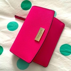 Kate Spade leather card wallet with jetting attachment.